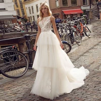 luxury a line wedding dresses 3d three dimensional applique sleeveless backless charming gowns layered tulle robe de mari%c3%a9e