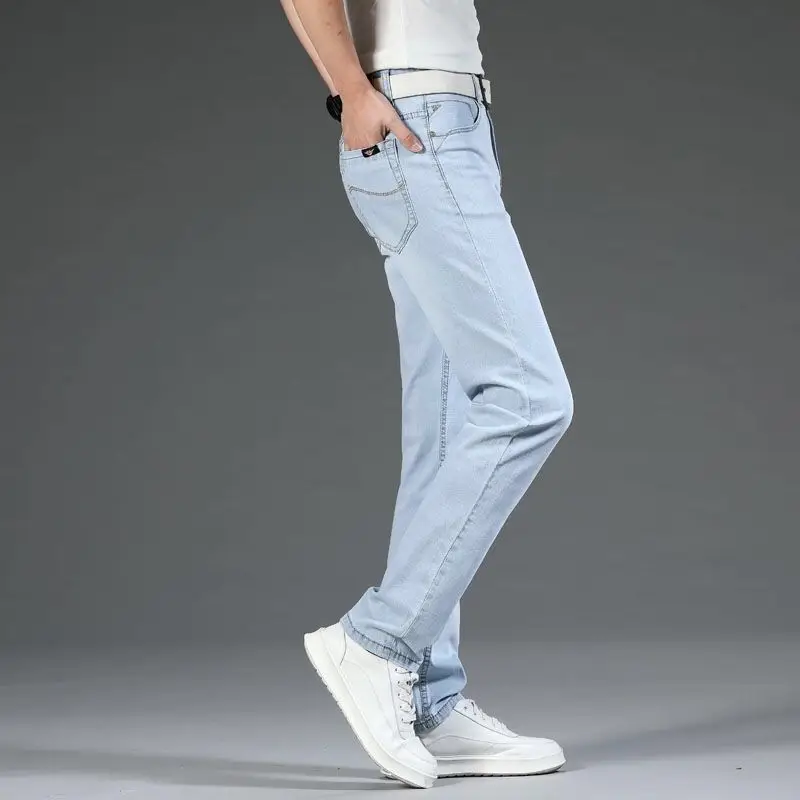 2021light jeans men's plus size straight loose elastic high-end tide brand light blue and white casual trousers bleached jeans