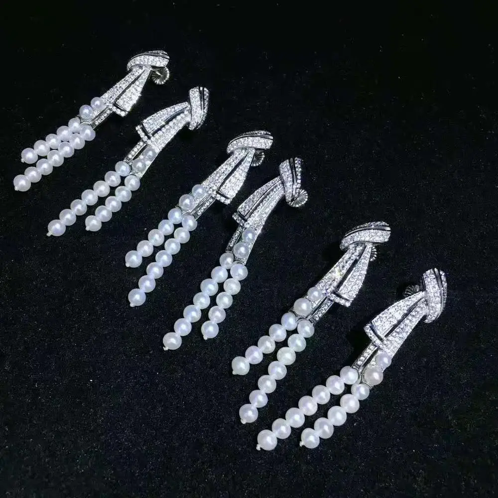 

White Pearl Cz pave White Golden Plated Stud Earrings