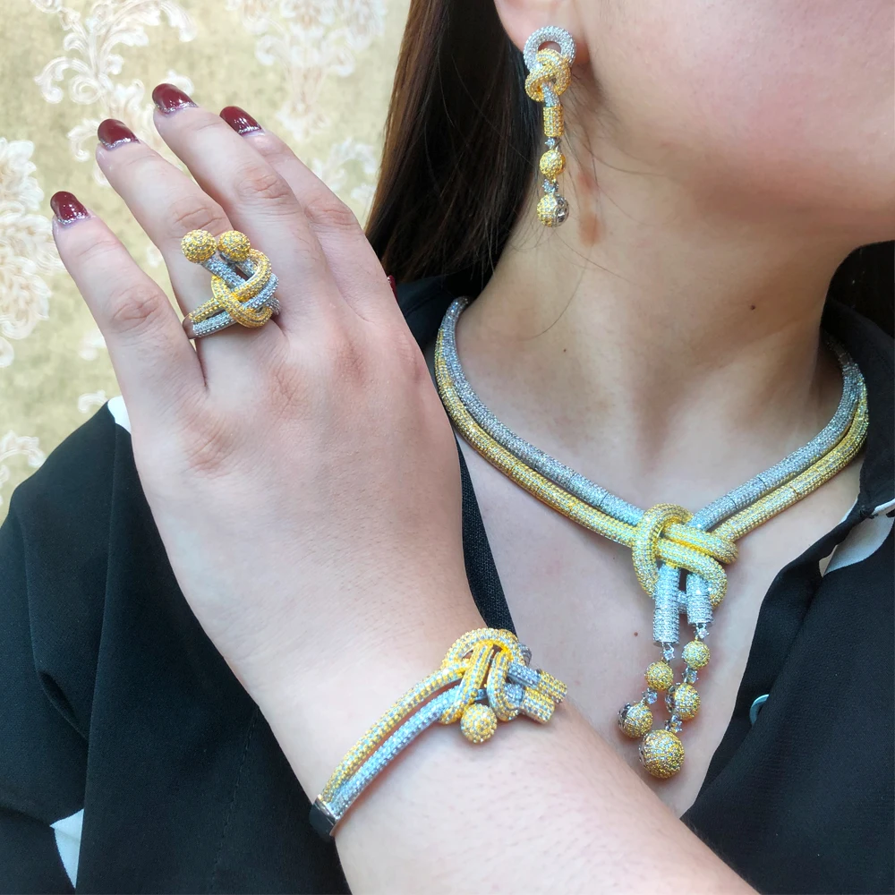 

Soramoore Luxury 4PCS Gold Trendy Necklace Bracelet Earrings Ring Jewelry For Women Wedding African Nigerian Party Jewelry Set