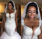 Фатиновое блестящее свадебное платье с рукавами-крылышками и бусинами