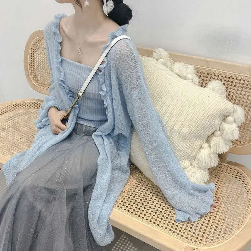 

Length knitted cardigan sweater 2021 Korean thin coat loose female student length knitted cardigan shawl hollow sunscreen