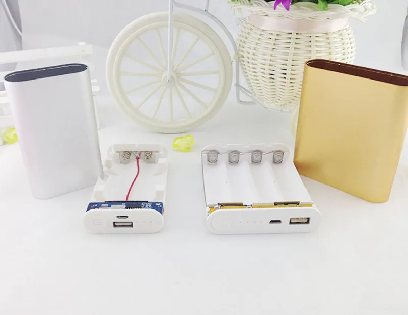 Внешний аккумулятор на 11200 мА · ч с 4 USB портами 18650 ч| |