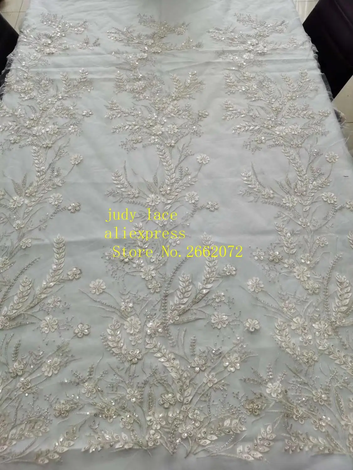 

5yards/bag Silver sequins embroidered with beaded plant designs are used in high-end fabrics for wedding dresses LPX15#