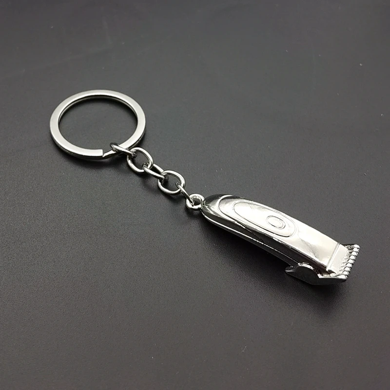 Ключница парикмахерской 2021 года с ножницами, машинкой, феном и бритвой в виде подвески на брелоке "украшение-подарок".