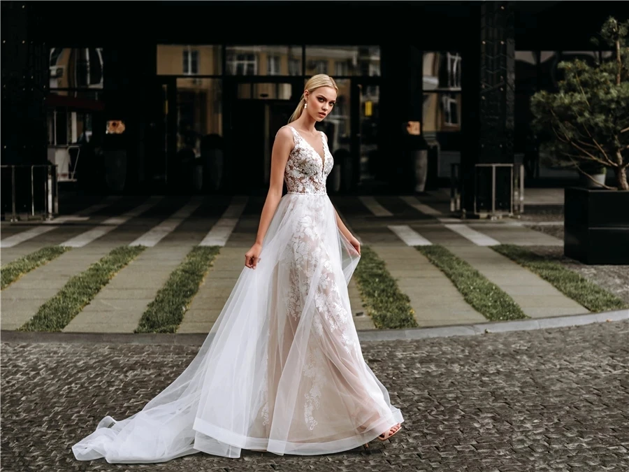 

Backless Wedding Dresses A-line V-neck Tulle Appliques Lace Boho Dubai Arabic Wedding Gown Bridal Dress Vestido De Noiva