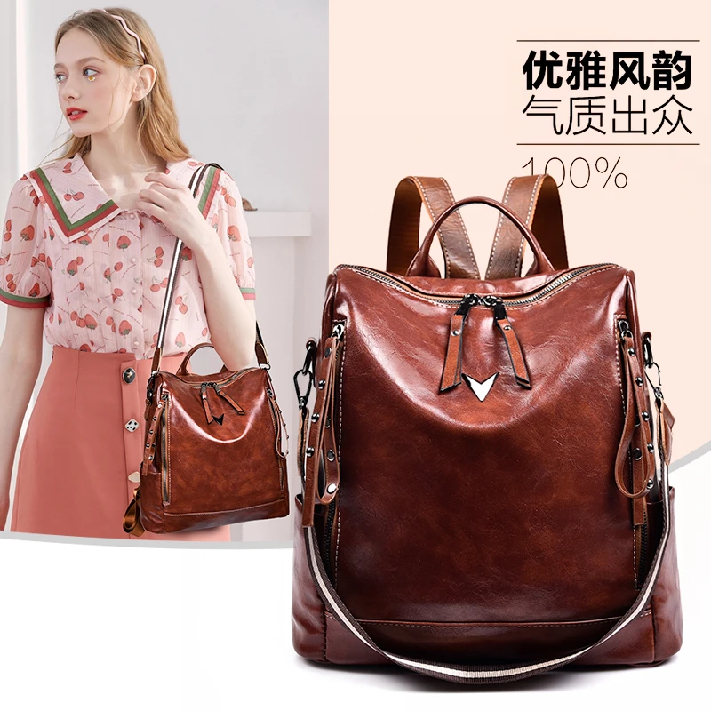 

YILIAN Bright face backpack female 2021 new fashion joker advanced sense soft leather large capacity travel backpack