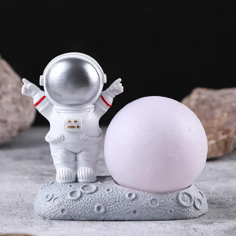 

Spaceman Model Mobile Phone Holder Night Light Resin Storage Decoration Crafts Creative Gifts Astronaut Night Light