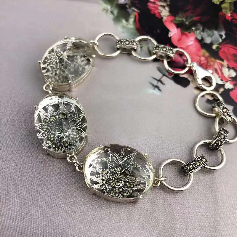 

Серьги и кольцо из серебра 925 пробы с натуральным белым кристаллом