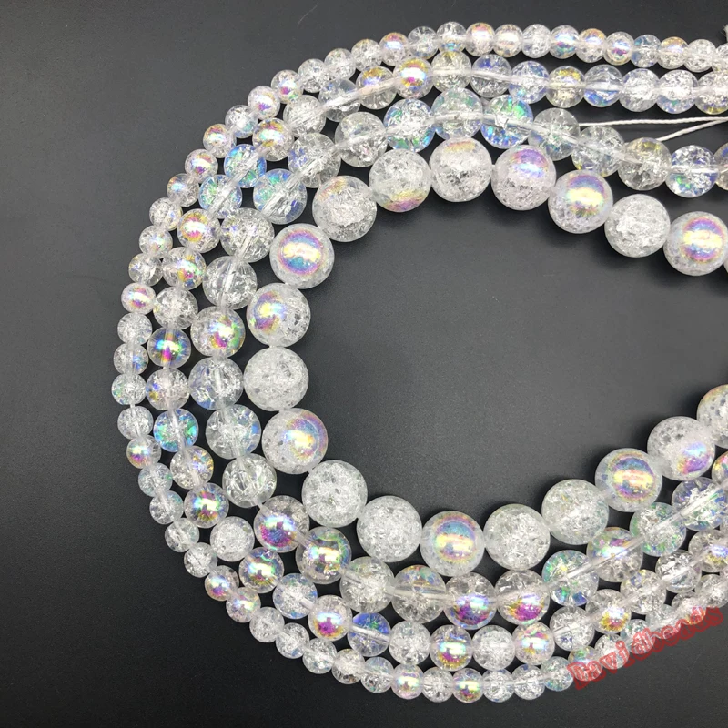 Бусины с натуральным камнем покрытые разноцветными белыми кристаллами