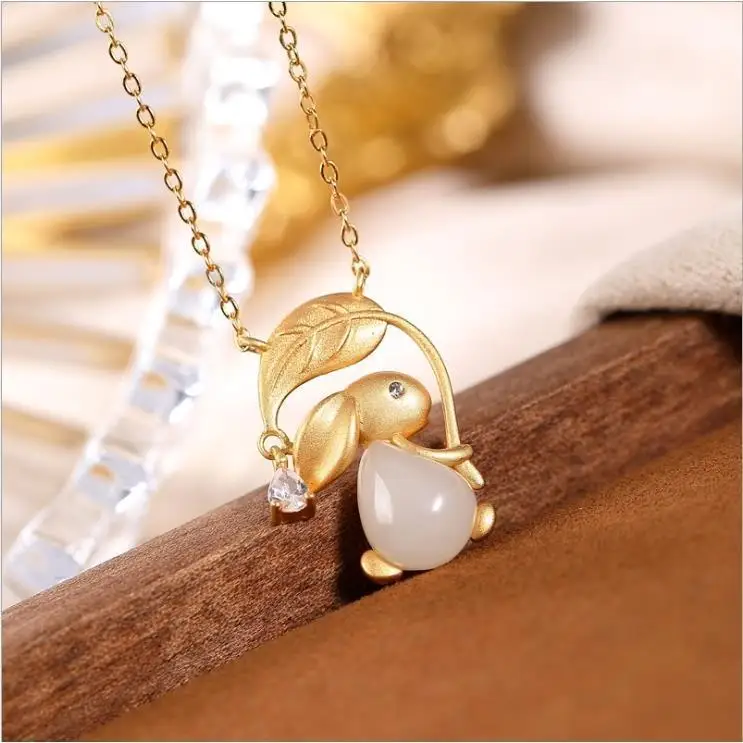 

Natural Hetian Jade Golden Branch Jade Hare Zodiac Rabbit Pendant 2021 hot new style Pendant Gold Plated White Jade Hare Clavi