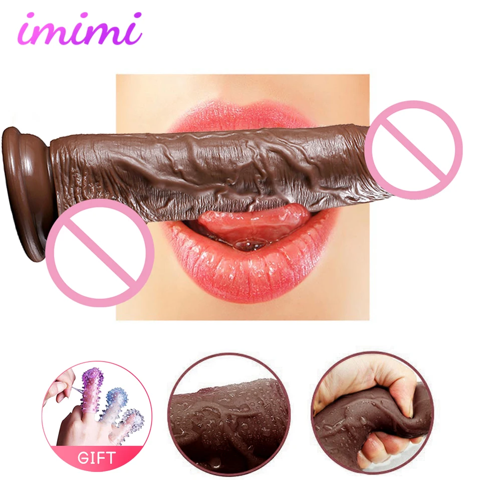 Большой черно коричневый фаллоимитатор на ощупь с изгибом реалистичный