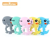 keepgrow 1pc dinosaur shaped food grade silicone baby teethers pendant necklace accessory bpa free chew toys 5 colors