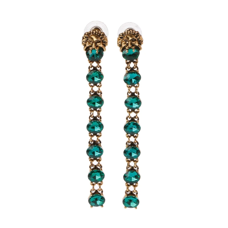 Длинные серьги с зелеными кристаллами подвеской в виде головы льва и жемчуга