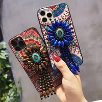 suitable for iphone 12 12pro 12promax silicone protective phone case with sunflower rhinestone tassel magic eye phone case