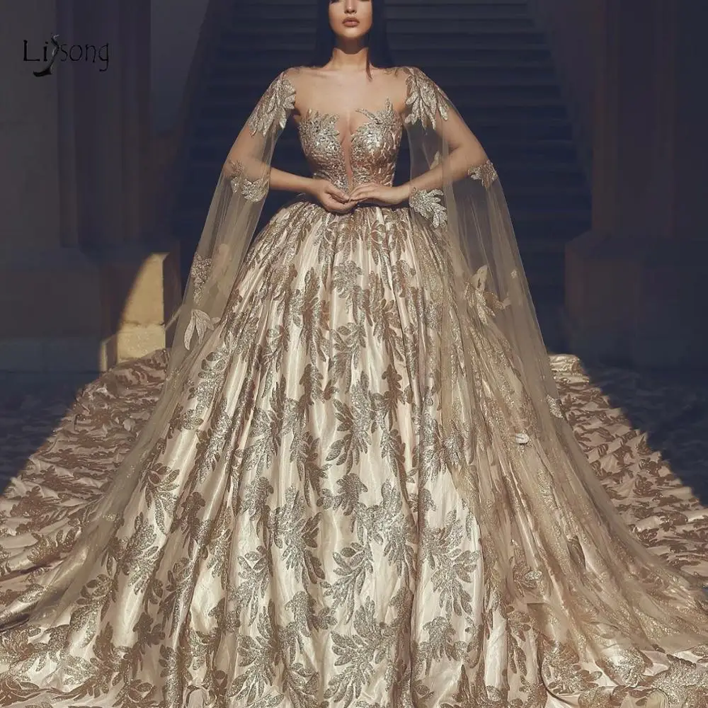 

Dubai Luxury Gold Wedding Dresses 2020 Sparkle Unique Leaf Lace Wedding Gowns With Cloak Custom Made Vestido De Novia
