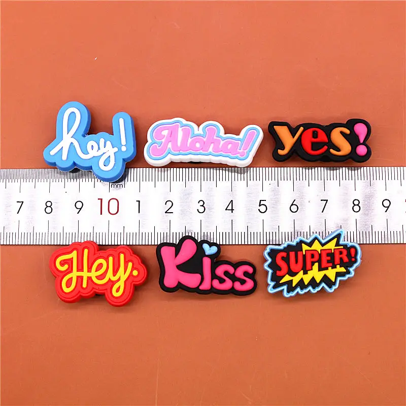 Crock Charms Accessories Custom Cartoon PVC Shoe Croc Buttons Sandals Charm Decoration Hey Super Yes Kiss Aloha Free Shipping