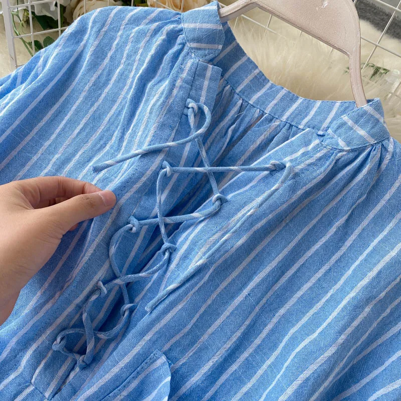 Женская блузка в полоску с перекрестными завязками V-образным вырезом и