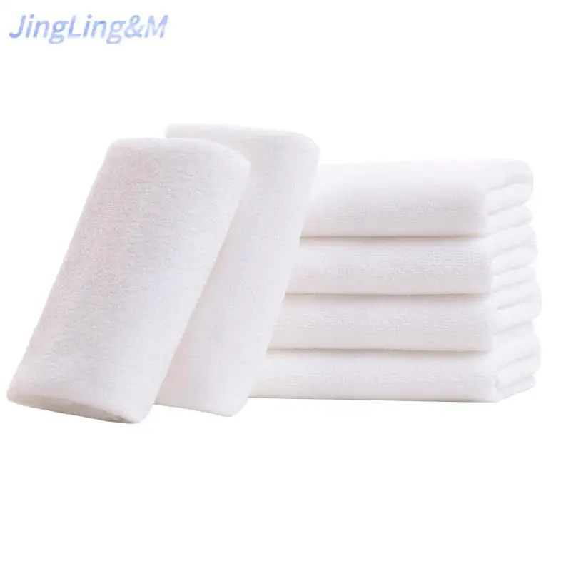 Одноразовое банное полотенце белое безворсовое абсорбирующее быстросохнущее