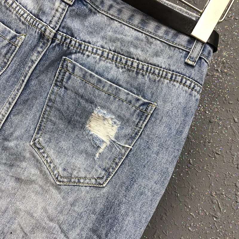 

SHENGPALAE Personality Tassel Beaded Denim Skirt Women's Summer 2021 New High Waist Hole Loose Slim Above Knee Skirt Female 5B91