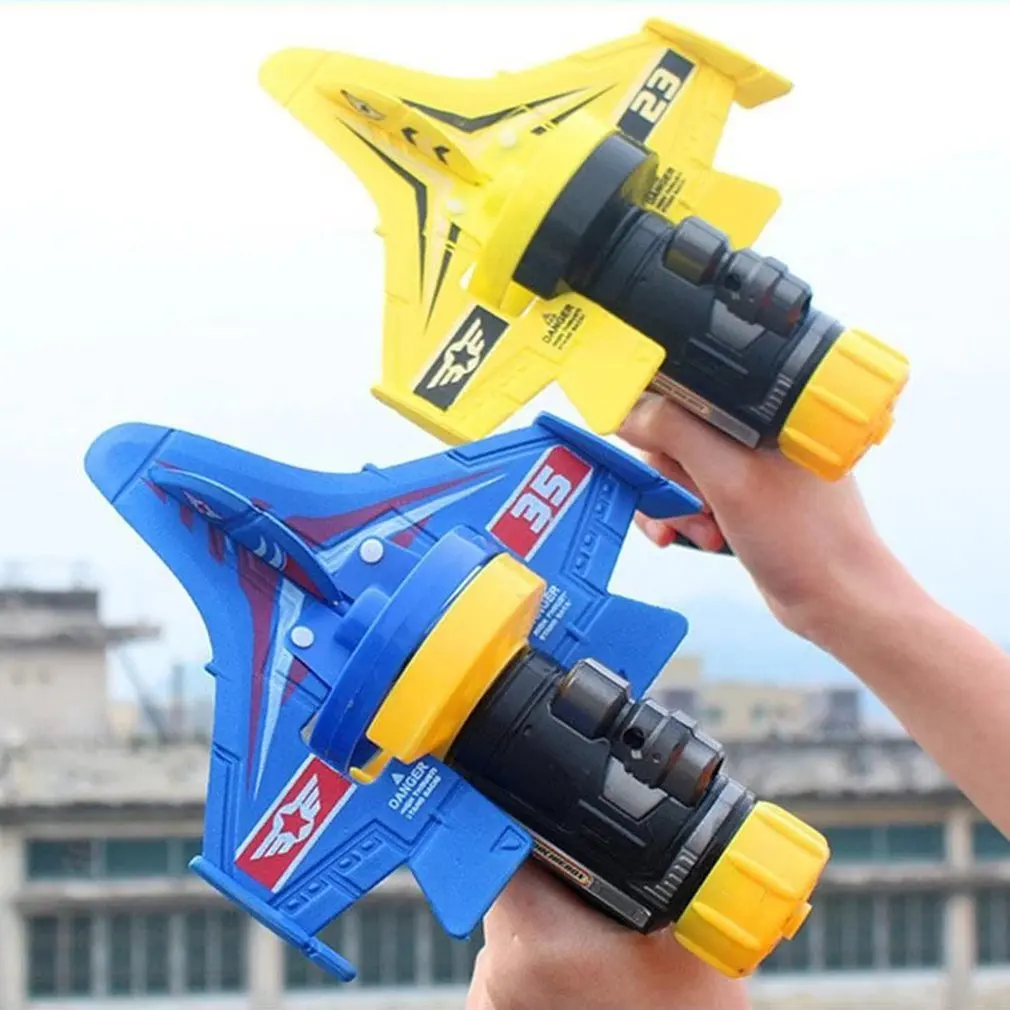 

2021 New Hand Throwing Swivel Catapult Foam Aircraft Launcher Aircraft Gliding Pistol Outdoor Children Random Color