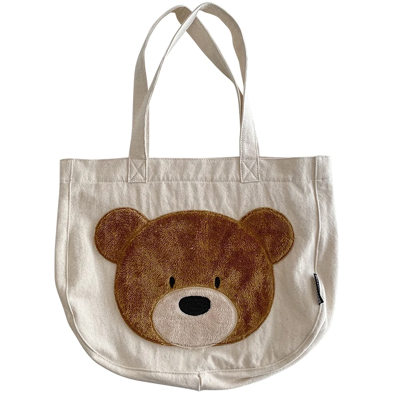 

Cute cartoon canvas bag female large capacity shoulder bag Korean version ins soft cute student portable bag