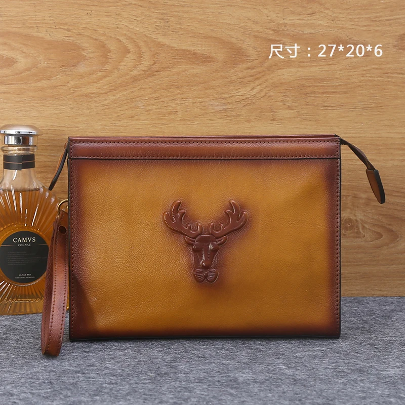 

New genuine leather man bag vegetable leather eraser hand bag deer head large capacity men’s washing gargle high-end hand bag