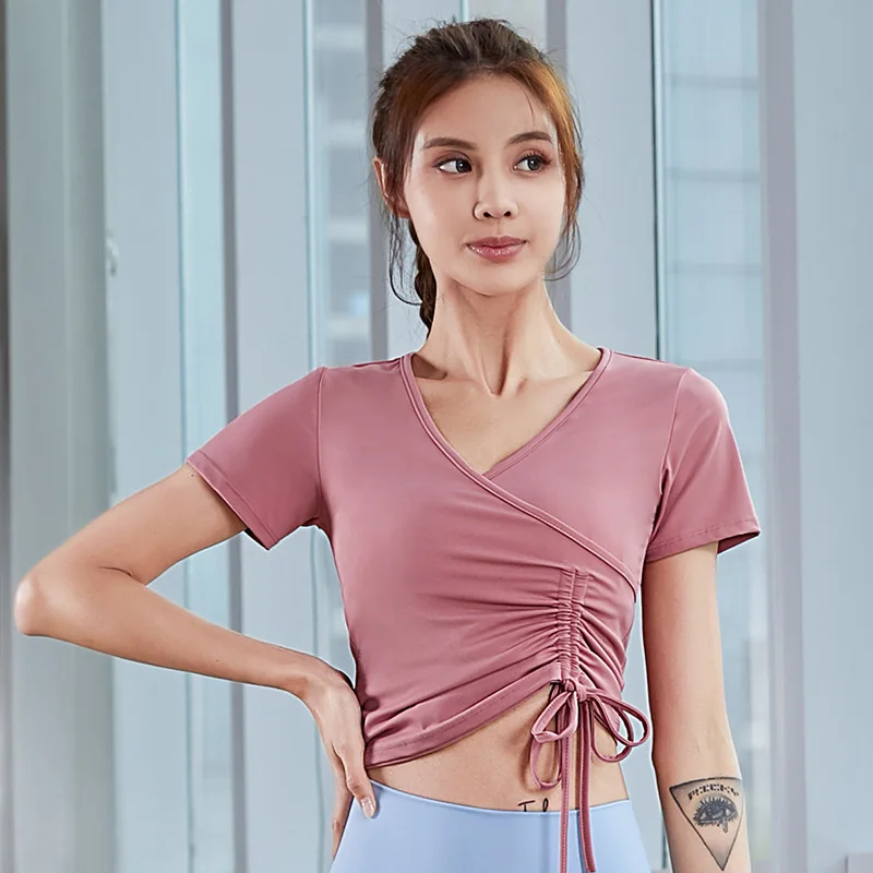

2021 summer new yoga sportswear women's breathable running fitness exercise sweat wicking elastic slim fit short sleeve top