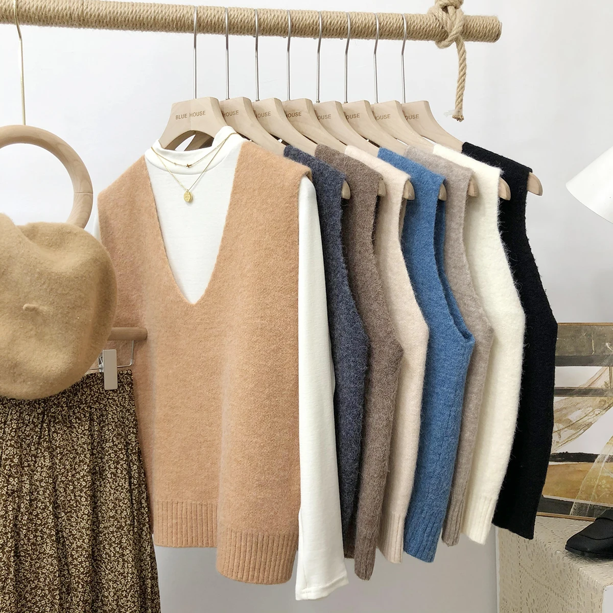 

2021 Autumn and Winter Women's Solid Color V-neck Knitted Vest Vest Hood All-match Sweater Vest Simple Top