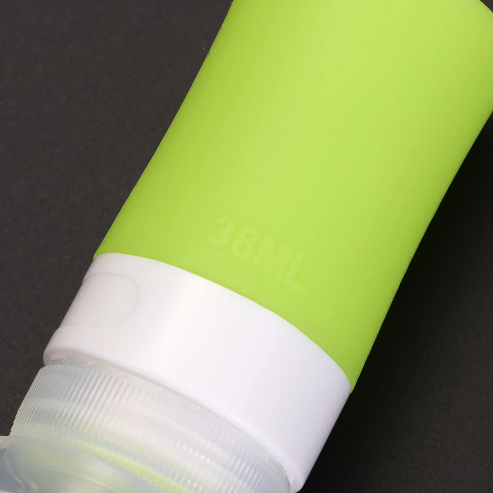 

4pcs 38ml Silicone Cosmetic Bottle Portable Cosmetic Blank Bottle Empty Travel Bottle (Pink, Green, White, Blue, 1pcs Each)
