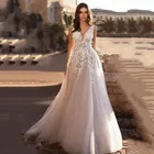 Женское свадебное платье в стиле бохо, привлекательное фатиновое платье до пола с V-образным вырезом, очаровательное платье невесты без рукавов, 2021