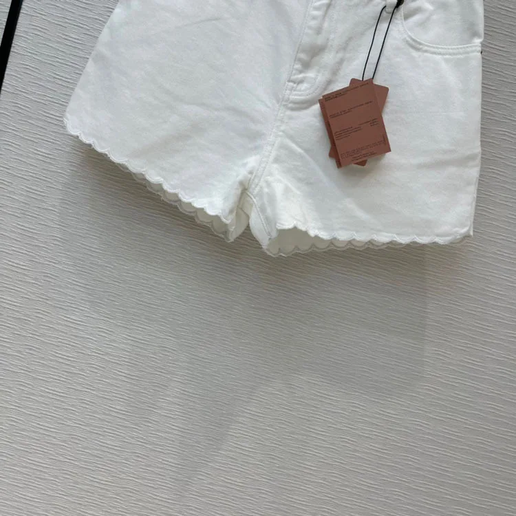 

2021 Summer women's new casual style simple solid lace embroidered high-waisted denim shorts