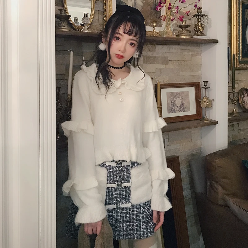 Свитер женский шерстяной с рукавами-фонариками и воротником в виде лепестков |