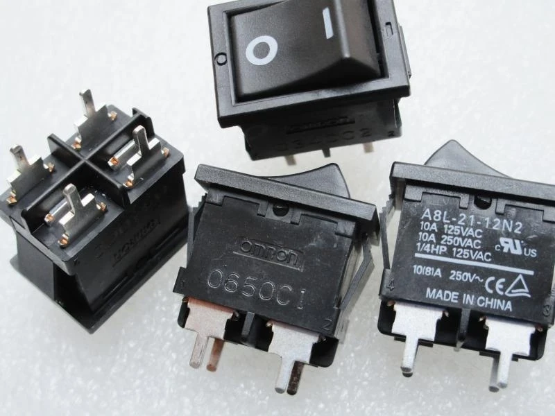 

2pcs Genuine Original OMRON 4 Feet 2 Files Rocker Switch 10A 250V A8L-21-12N2