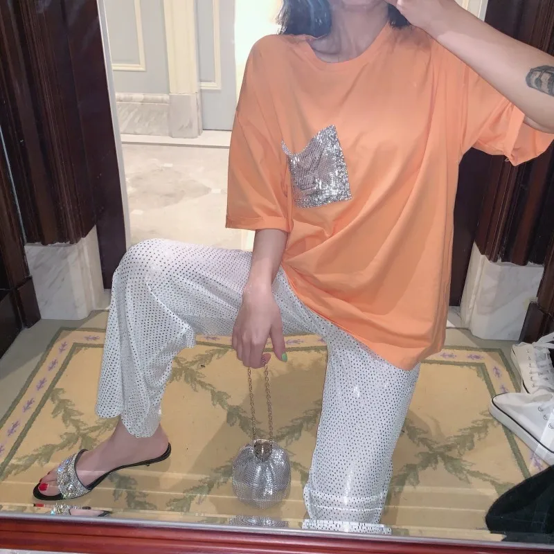 Футболка женская оверсайз с рукавом до локтя круглым вырезом и карманами |