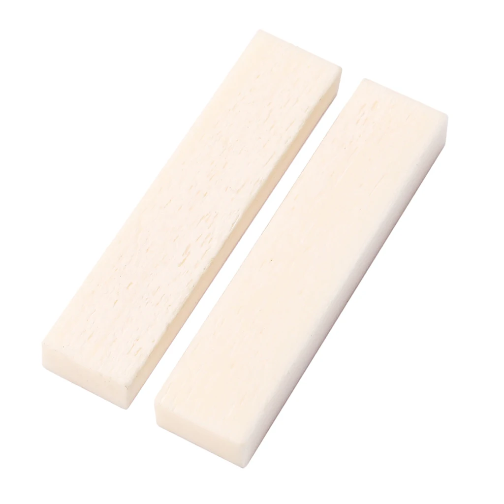 

White 2 Pcs Unslotted Bridge Saddles Nuts Bridge Nut 53x7x3mm