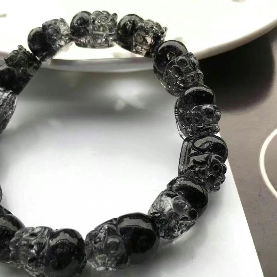Preise Natürliche Schwarz Rutilated Quarz Kristall Armband Klar Pi Xiu Geschnitzte Perlen 15x10mm Stretch Frauen AAAAAA Zertifikat