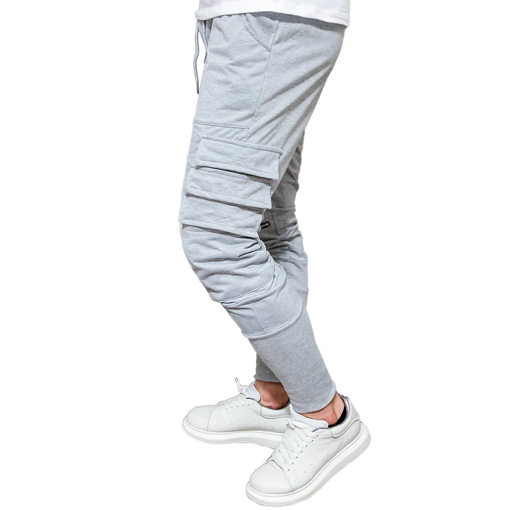 

European code spring and autumn men's solid color zipper pocket decoration trousers leg screw sports trousers long men's casual