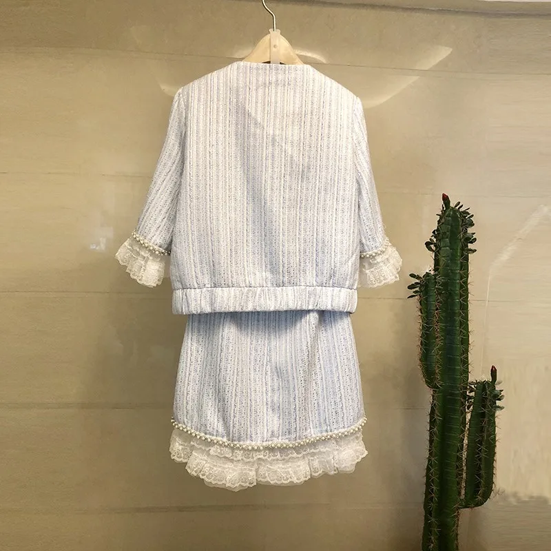 Весенне летний модный комплект из короткой куртки и юбки украшенной бисером 2020