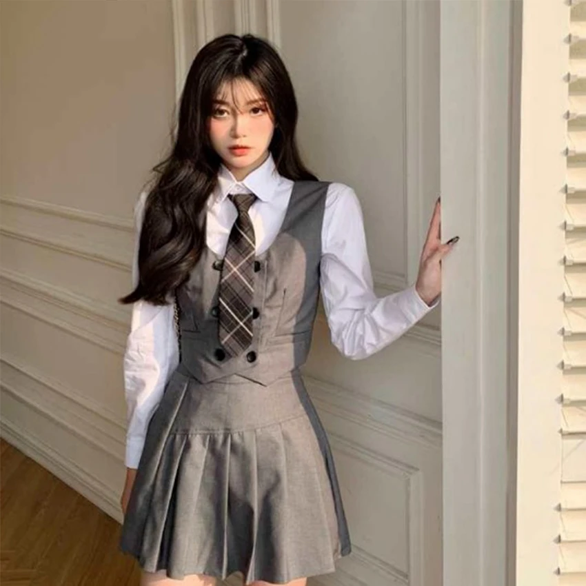 

Японский модный костюм Jk в студенческом стиле, школьная форма, наряд для девочек, повседневный жилет, куртка, плиссированная юбка с галстуко...