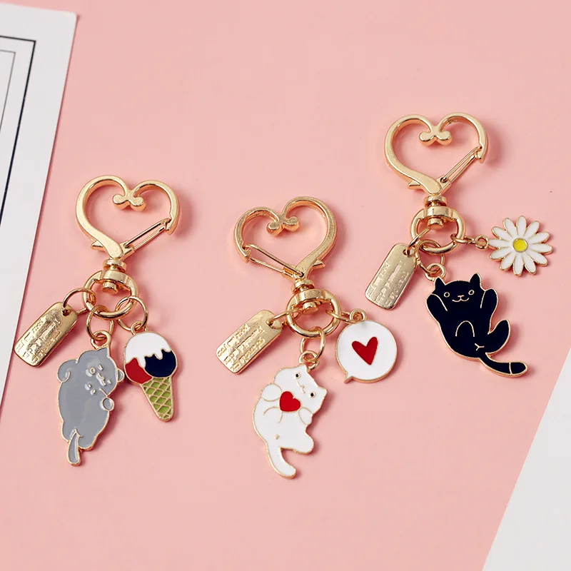 

ins Cartoon Cute Kitten Cat Car Keychain Headset Charging Box Pendant Men's Women's Universal Couple Backpack Bag Jewelry Gifts