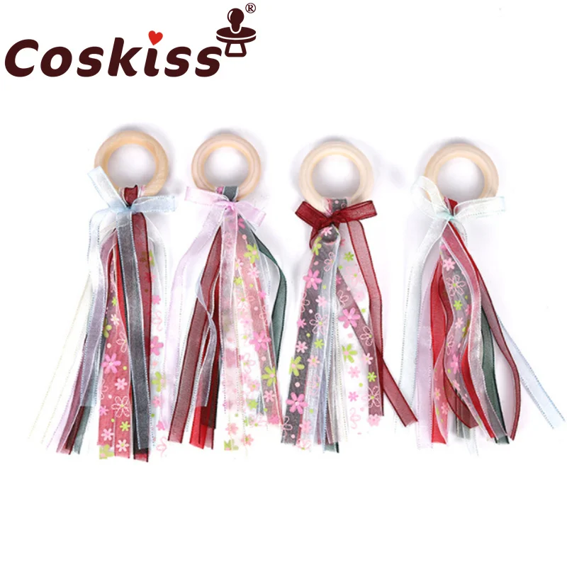 

Coskiss New Baby Teething Stick Teether Toy Color Printing Ribbon Bowknot Children's Room Decoration Molar Toy Gift
