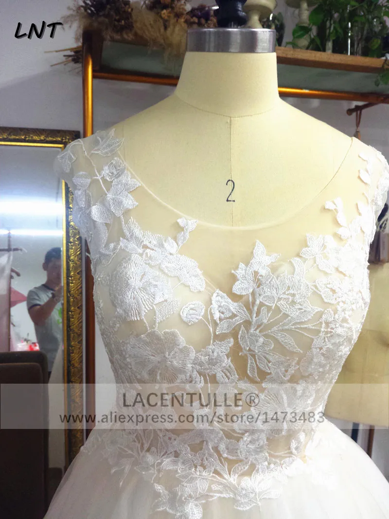 Реальные фотографии дизайнерских свадебных платьев Прозрачный лиф кружевное
