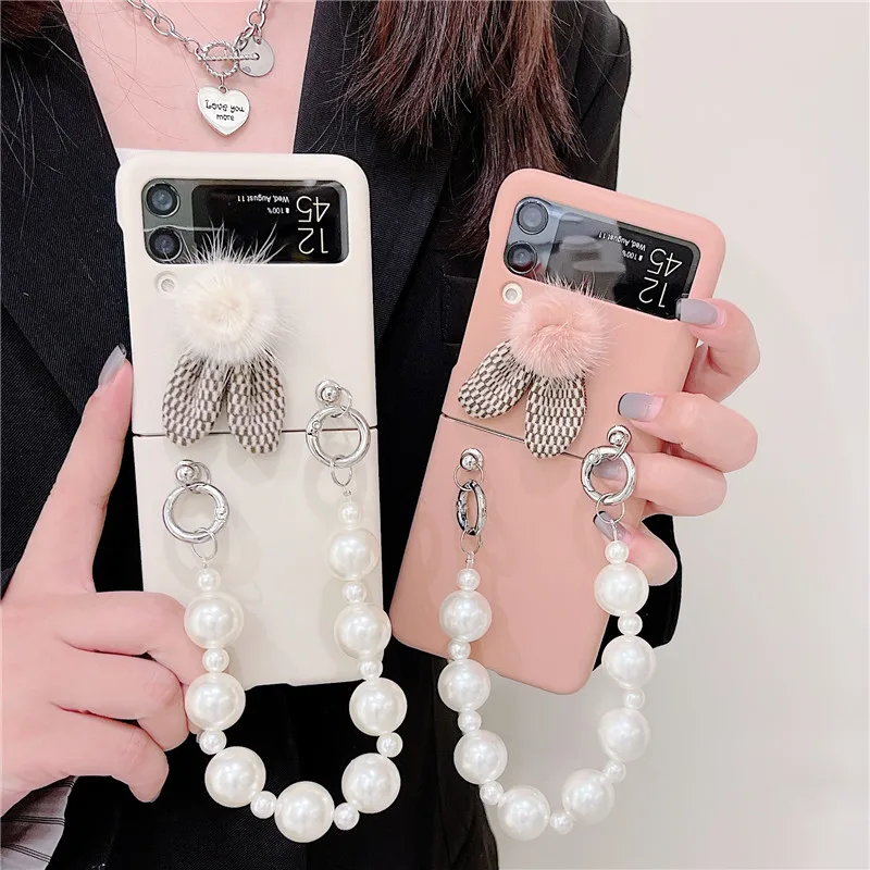 

Luxury Pearl Bracelet Phone Cases For Samsung Galaxy Z Flip 3 Fashion Plush Rabbit Ears Case For Samsung Z Flip3 ZFlip3 Zflip 3