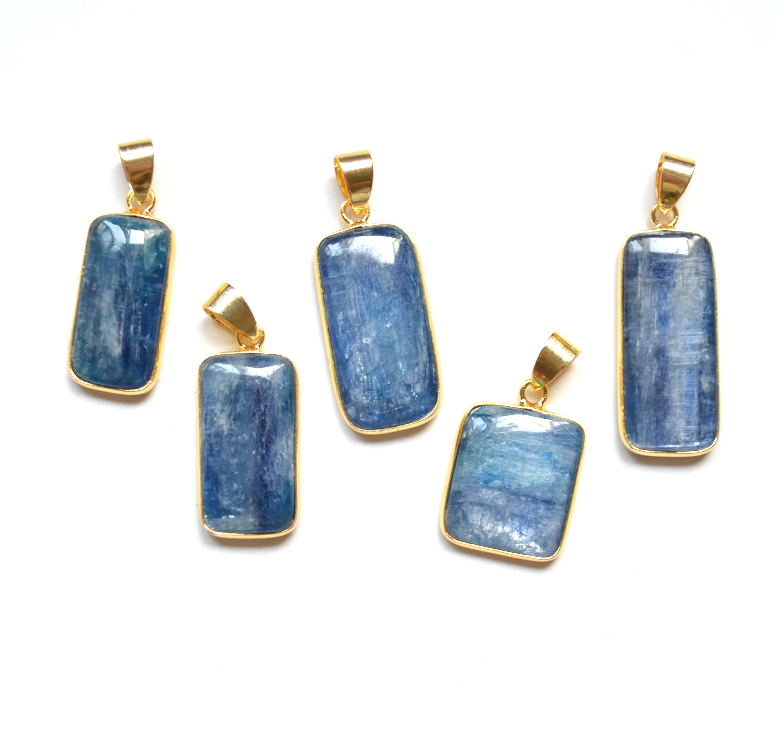 

Raw Blue kyanite rectangle shape pendant with Gold electroplated edges