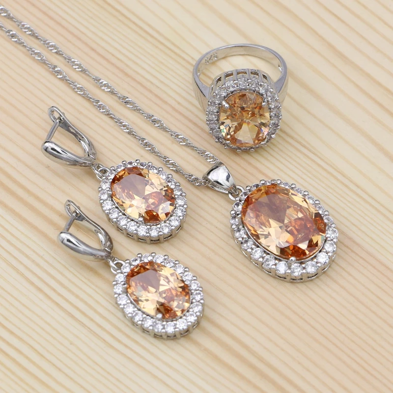 

Комплект из колье, серёг и кольца, из серебра 925 пробы