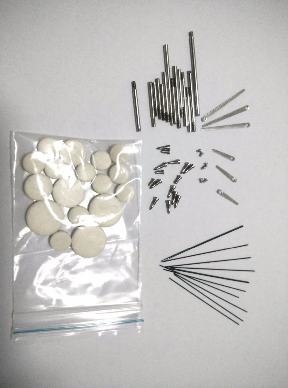 

Clarinet repair parts.Shaft rod/ screw/reed/ needle spring/ mat/A set of
