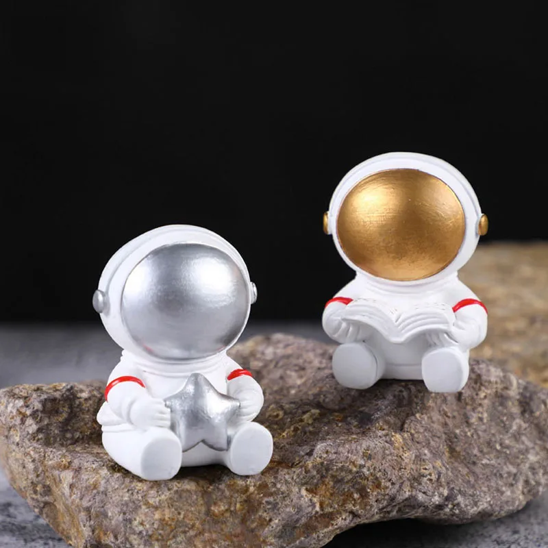 

Cute Astronaut Spaceman Creative Mobile Phone Holder Toys Art Action Figure Model Speelgoed Home Office Desktop Decoration