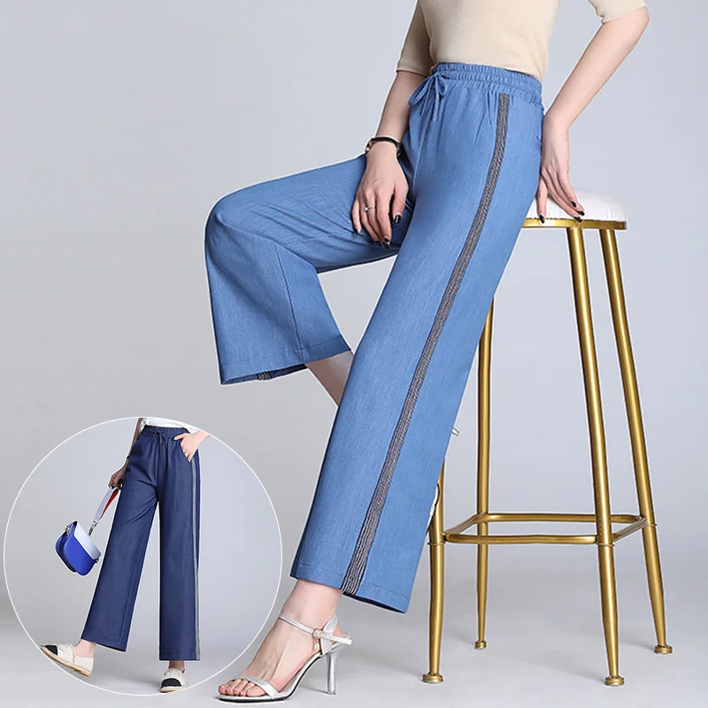 Женские летние джинсы с широкими штанинами тонкие однотонные на шнуровке