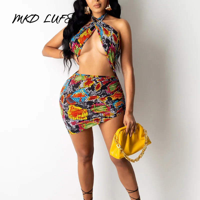 

Сексуальное летнее женское мини-платье с вырезами и лямкой на шее